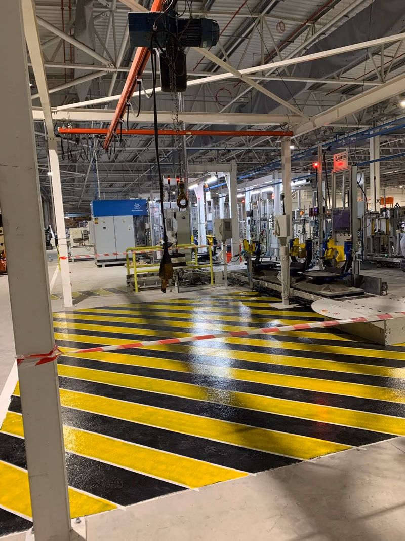 2MIC : Zone dangereuse hachurée sous les machines